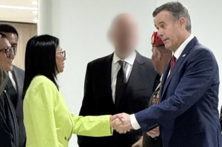 Delcy Rodriguez swearing allegiance to CIA Director John Ratcliffe.